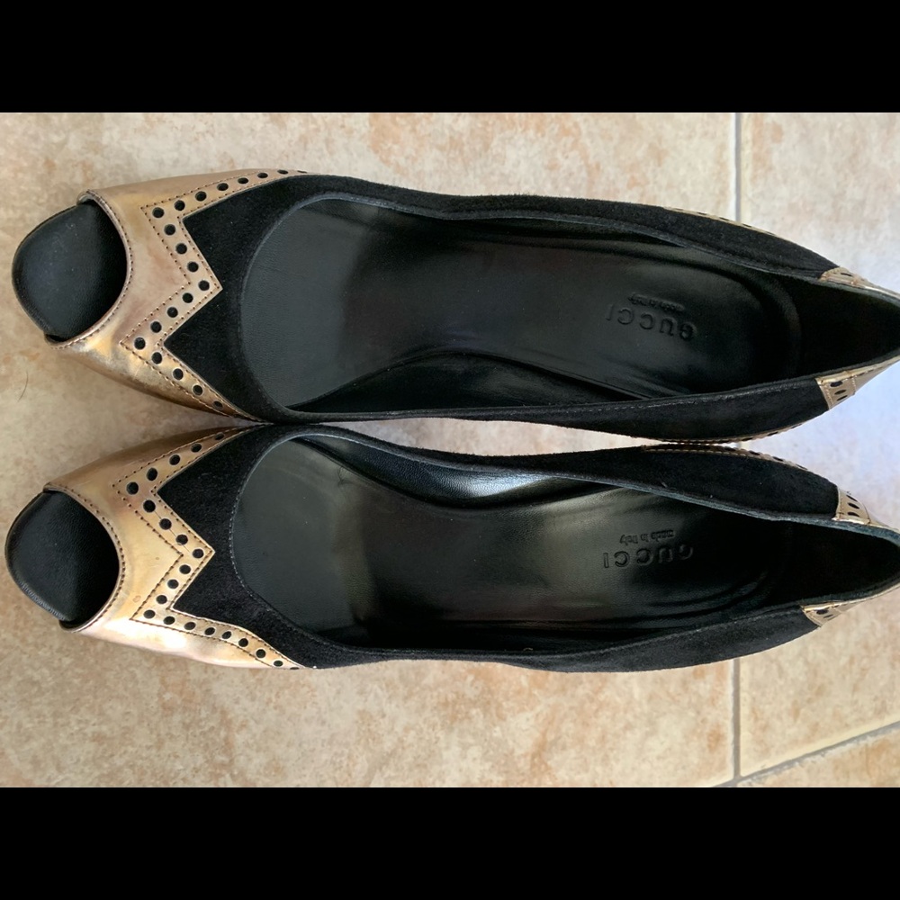 Gucci gold and black suede high heels.